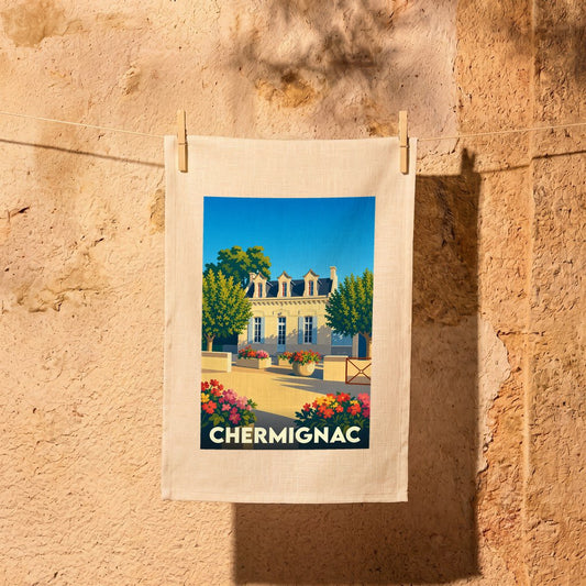 Torchon souvenir de la ville de Chermignac avec une illustration stylisée d'une maison traditionnelle.
