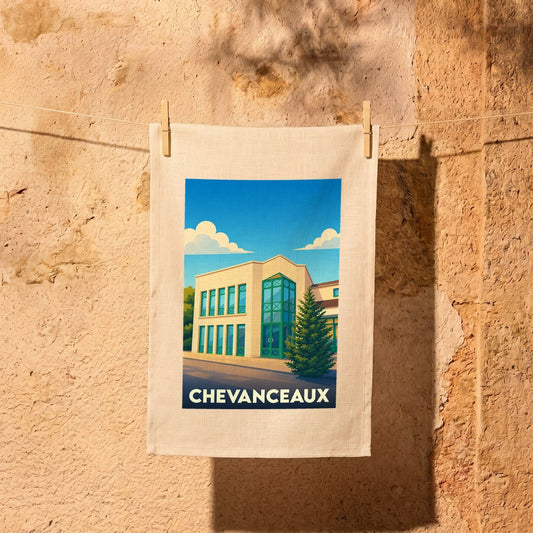 Torchon souvenir de la ville de Chevanceaux illustré d'un bâtiment moderne sous un ciel azur.