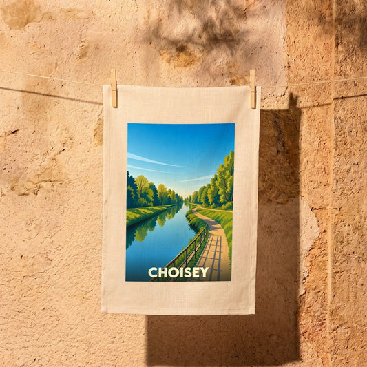 Torchon souvenir de la ville de Choisey avec une illustration stylisée d'un canal bordé d'arbres.