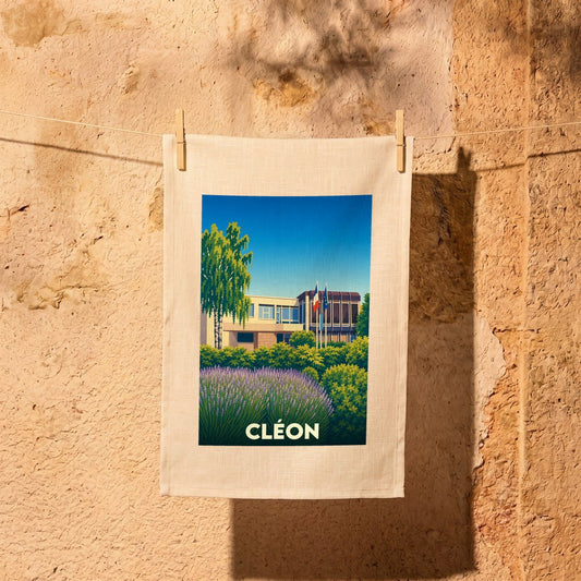 Torchon souvenir de la ville de Cléon avec une illustration stylisée de son architecture et de sa végétation.