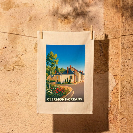 Torchon souvenir de la ville de Clermont-Créans avec une illustration stylisée.