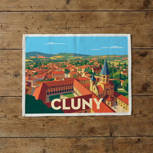 Torchon souvenir de la ville de Cluny avec une illustration stylisée de son abbaye et de ses paysages.