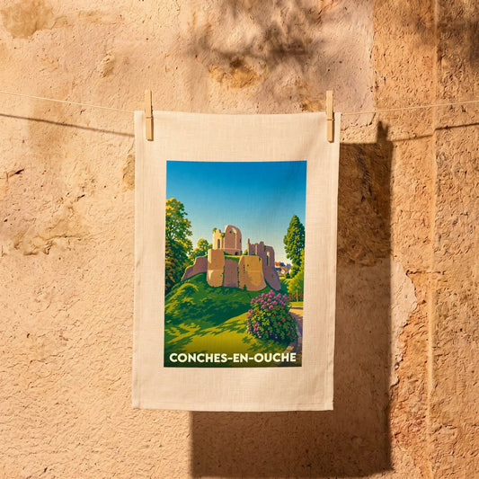 Torchon souvenir de la ville de Conches-en-Ouche avec une illustration stylisée de son château médiéval.