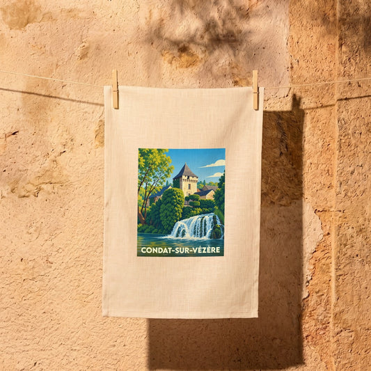 Torchon souvenir de la ville de Condat-sur-Vézère avec une illustration stylisée.