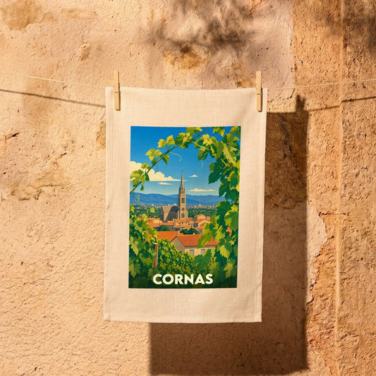 Torchon souvenir de la ville de Cornas illustré d'un paysage de vignobles et de son église.