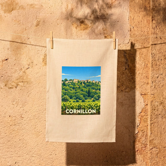 Torchon souvenir de la ville de Cornillon orné d'une illustration stylisée de ses paysages provençaux.