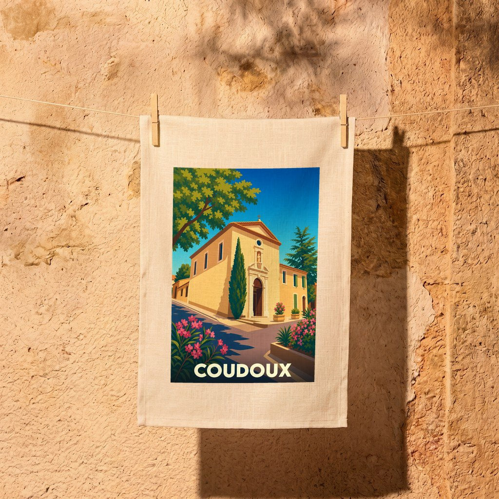 Torchon souvenir de la ville de Coudoux avec une illustration stylisée de son église sous un ciel bleu.