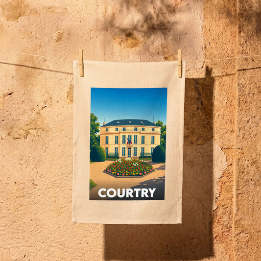 Torchon souvenir de la ville de Courtry avec une illustration stylisée de sa mairie et de ses jardins.