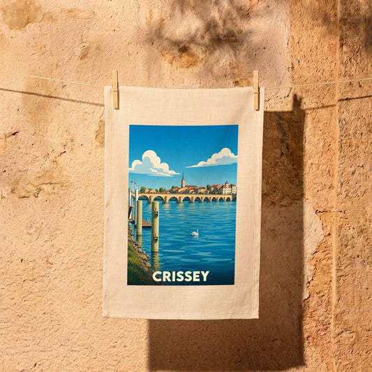 Torchon souvenir de la ville de Crissey avec une illustration stylisée d'un paysage fluvial.
