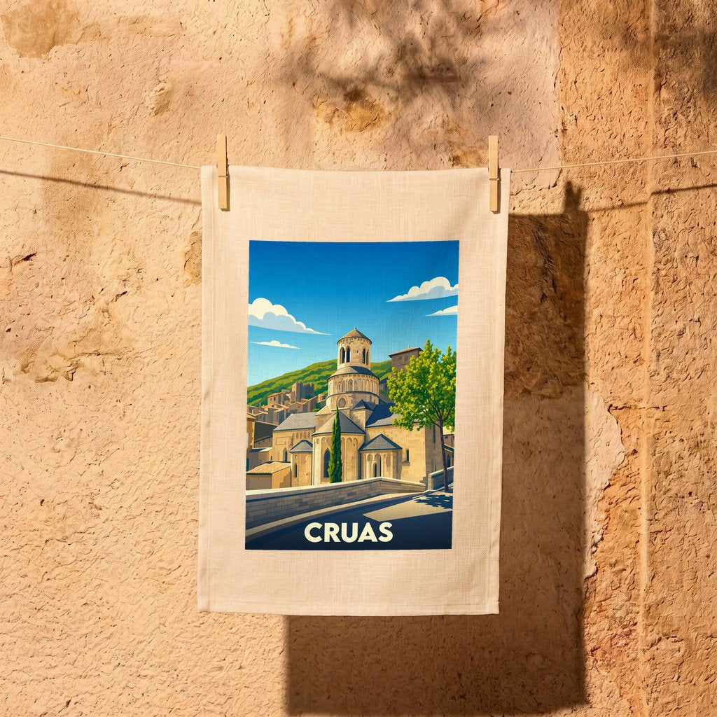 Torchon souvenir de la ville de Cruas avec une illustration stylisée de son église abbatiale.