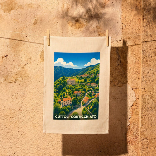 Torchon souvenir de la ville de Cuttoli-Corticchiato avec une illustration stylisée de son paysage vallonné.