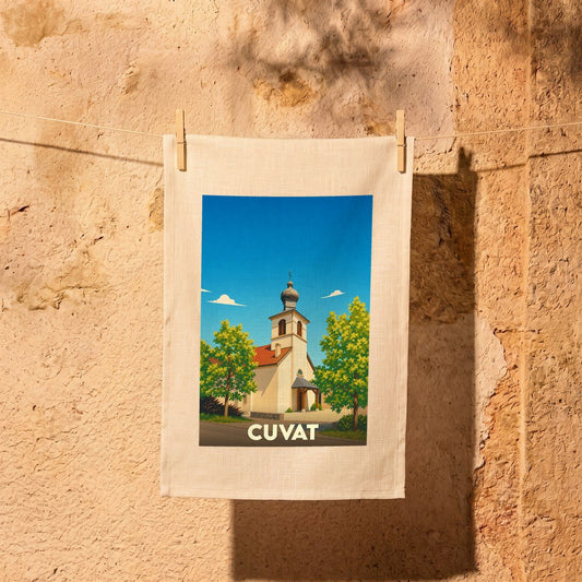 Torchon souvenir de la ville de Cuvat avec une illustration stylisée de son église.