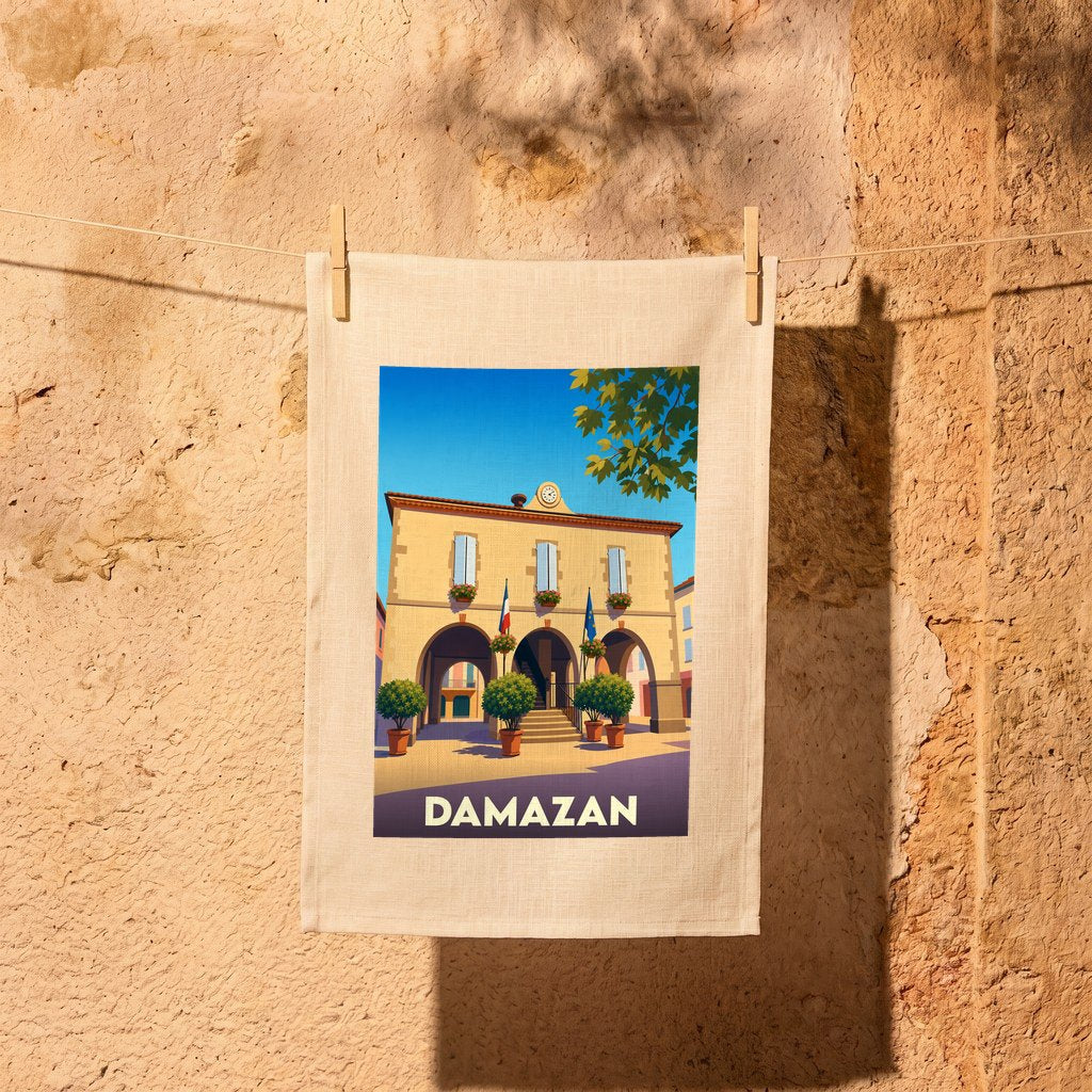 Torchon souvenir de la ville de Damazan orné d'une illustration stylisée de son hôtel de ville.