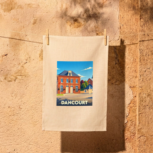Torchon souvenir de la ville de Dancourt avec une illustration stylisée.