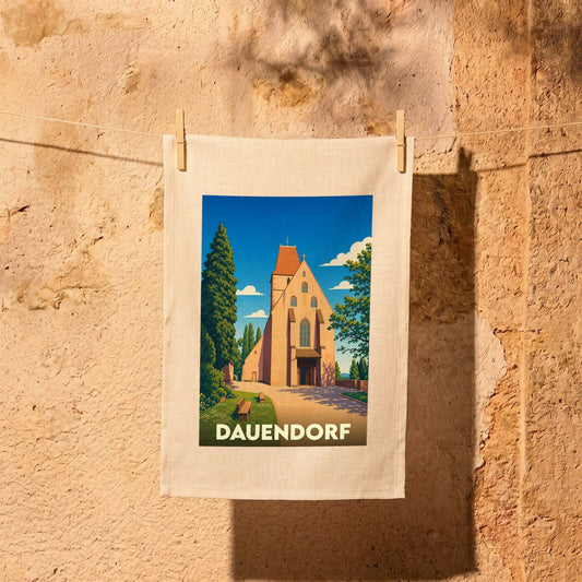Torchon souvenir de la ville de Dauendorf avec une illustration stylisée de son église.