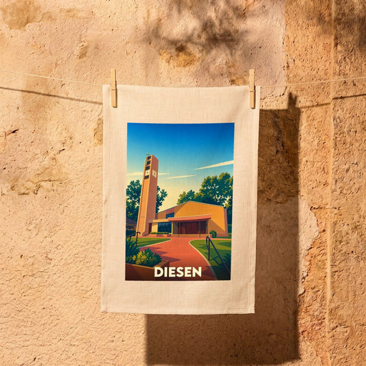 Torchon souvenir de la ville de Diesen orné d'une illustration stylisée de son architecture locale.