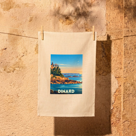 Torchon souvenir de la ville de Dinard arborant une illustration stylisée de son bord de mer.
