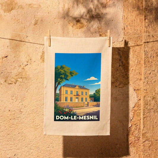 Torchon souvenir de la ville de Dom-le-Mesnil avec une illustration stylisée.