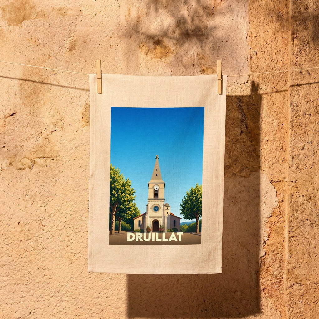 Torchon souvenir de la ville de Druillat illustré d'une église sous un ciel bleu.