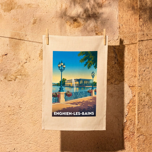 Torchon souvenir de la ville d'Enghien-les-Bains avec une illustration stylisée de son lac et de son casino.