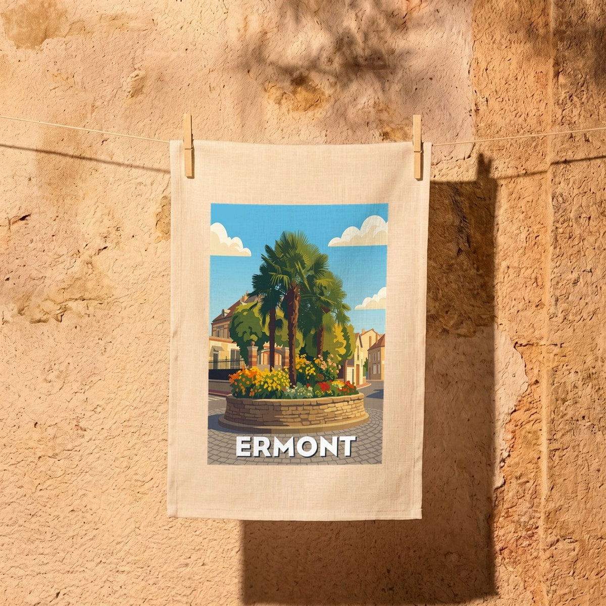 Torchon souvenir de la ville d'Ermont avec une illustration stylisée et colorée.