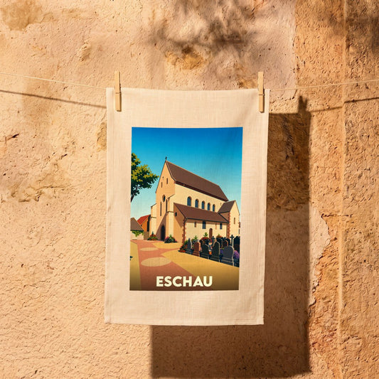 Torchon souvenir de la ville d'Eschau avec une illustration stylisée de son église et de son cimetière.