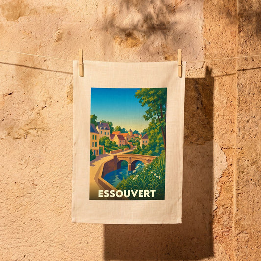 Torchon souvenir de la ville d'Essouvert avec une illustration stylisée d'un pont et d'un village.