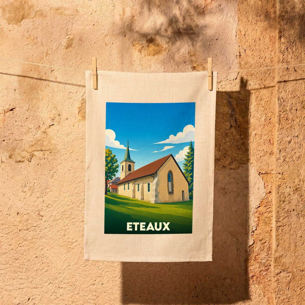 Torchon souvenir de la ville d'Eteaux avec une illustration stylisée de son église.
