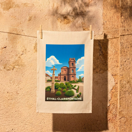 Torchon souvenir de la ville d'Étival-Clairefontaine avec une illustration stylisée de son abbaye et d'une croix monumentale.
