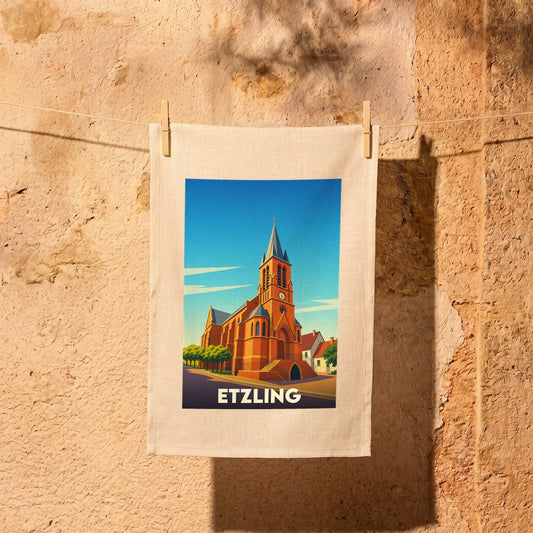Torchon souvenir de la ville d'Etzling orné d'une illustration stylisée de son église.