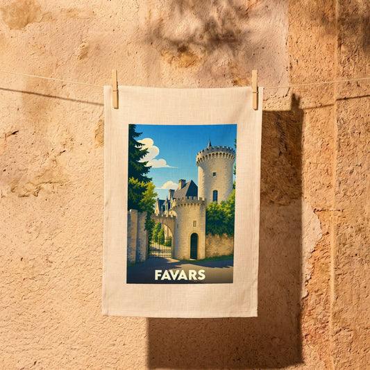 Torchon de cuisine souvenir de la ville de Favars orné d'une illustration stylisée de son château.
