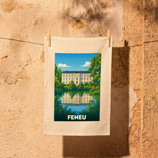 Torchon souvenir de la ville de Feneu avec une illustration stylisée d'un château se reflétant dans l'eau.