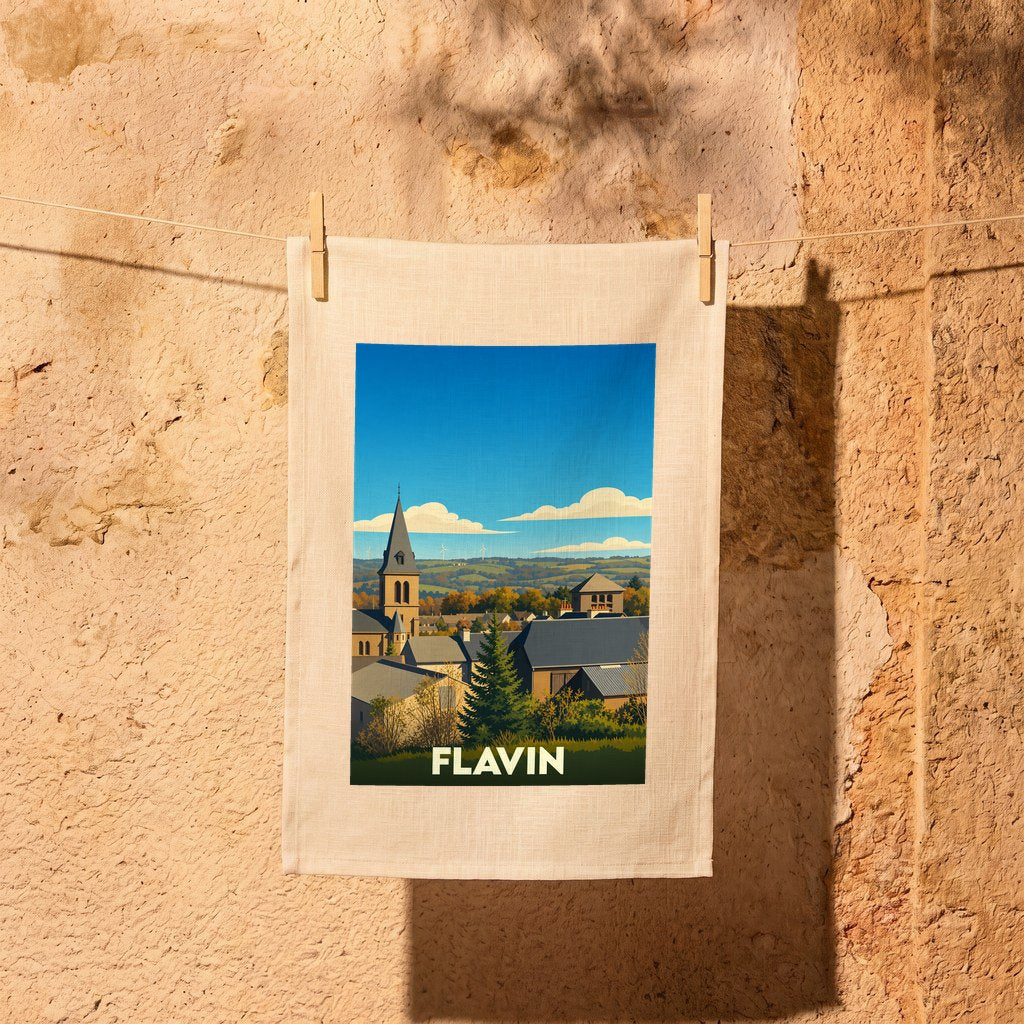 Torchon souvenir de la ville de Flavin avec une illustration stylisée.