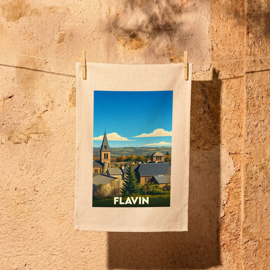 Torchon souvenir de la ville de Flavin avec une illustration stylisée.