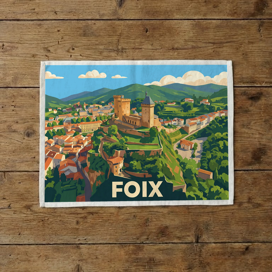 Torchon souvenir de la ville de Foix avec une illustration stylisée.