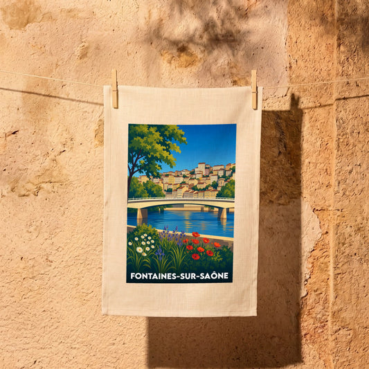 Torchon souvenir de Fontaines-sur-Saône avec une illustration stylisée de la ville et de son pont.