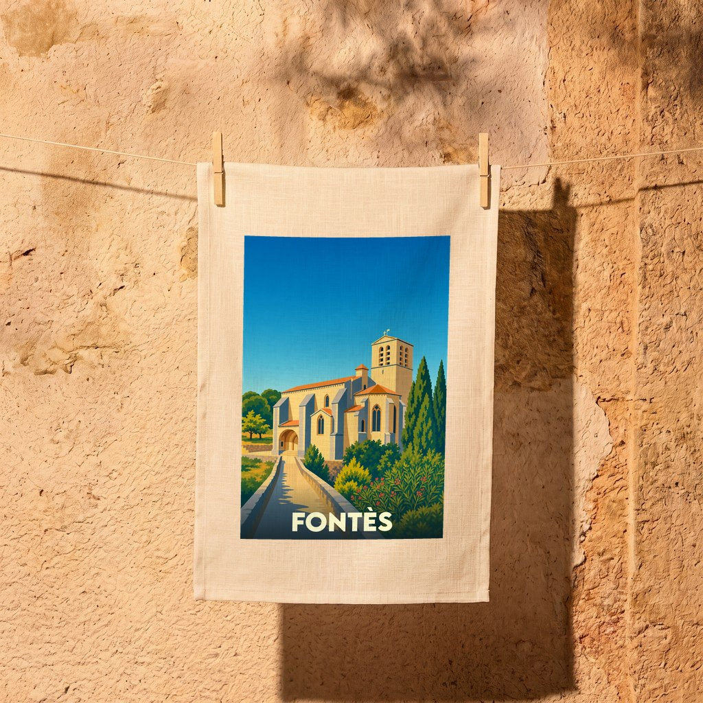 Torchon souvenir de la ville de Fontès avec une illustration stylisée de son église sous un ciel bleu.