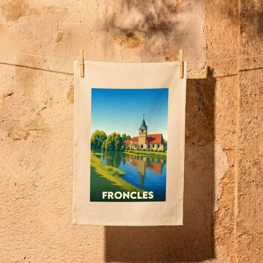 Torchon souvenir de la ville de Froncles avec une illustration stylisée.