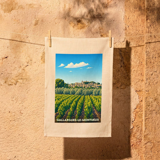 Torchon souvenir de la ville de Gallargues-le-Montueux avec une illustration stylisée d'un vignoble sous un ciel azur.