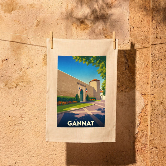 Torchon souvenir de la ville de Gannat avec une illustration stylisée.