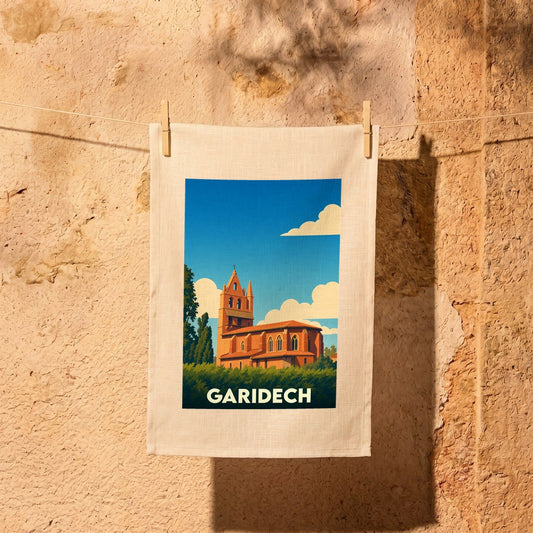 Torchon souvenir de la ville de Garidech avec une illustration stylisée de son église.