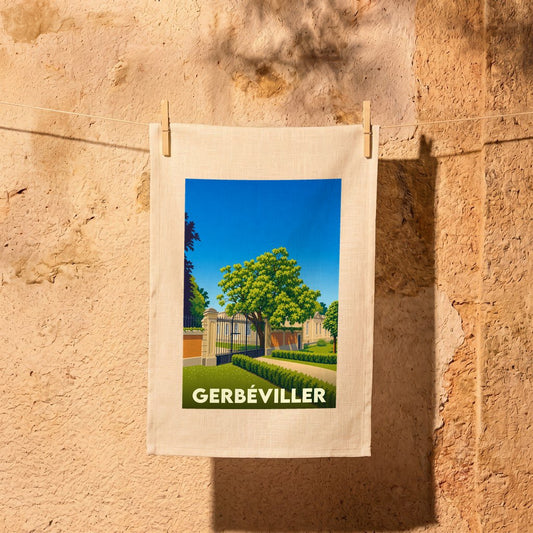 Torchon souvenir de la ville de Gerbéviller avec une illustration stylisée de son patrimoine.