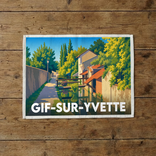 Torchon souvenir de la ville de Gif-sur-Yvette orné d'une illustration paysagère colorée.