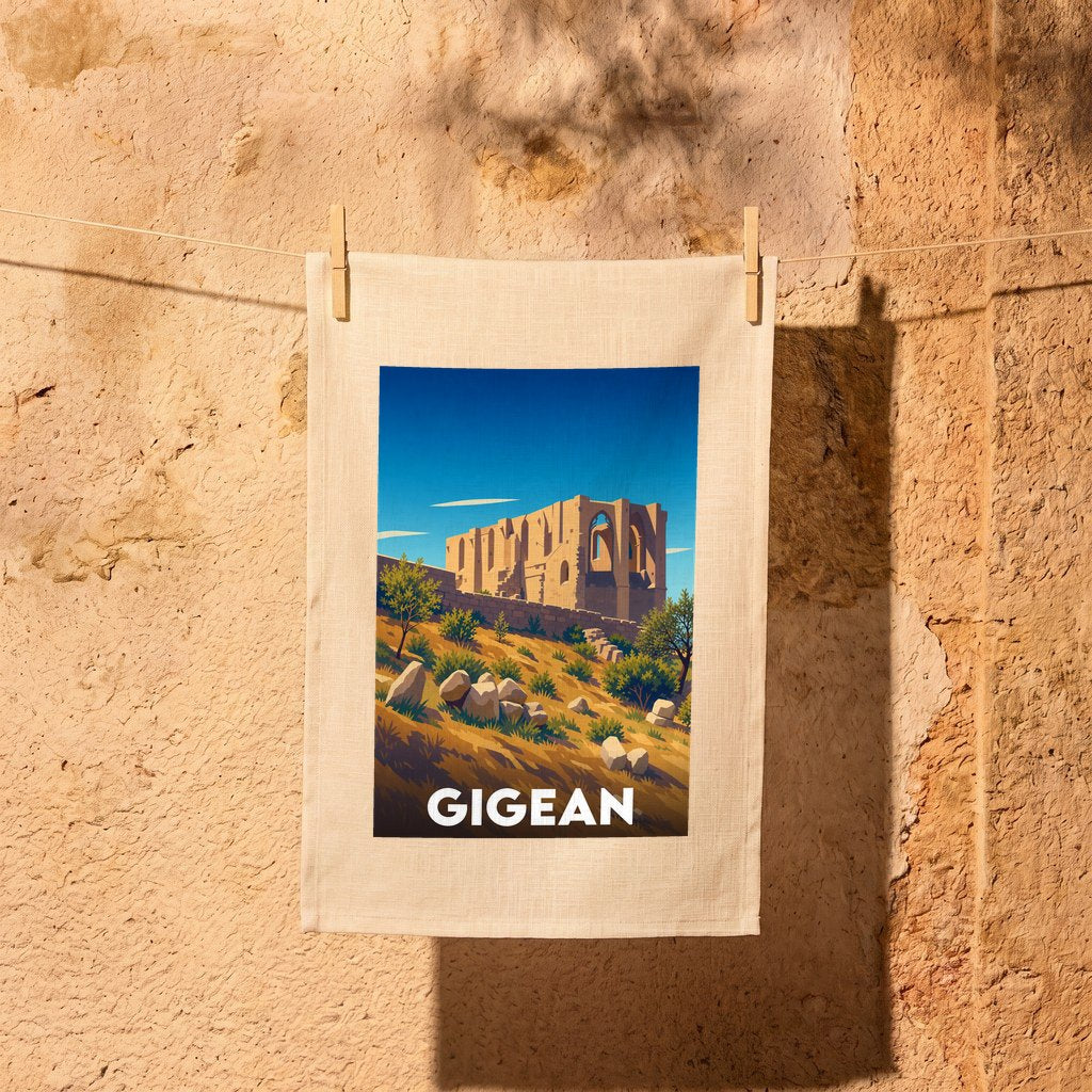 Torchon souvenir de la ville de Gigean avec une illustration stylisée de l'abbaye Saint-Félix-de-Montceau.