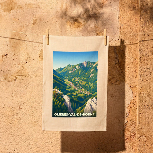Torchon souvenir de Glières-Val-de-Borne illustré d'un paysage montagneux stylisé.