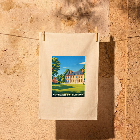 Torchon souvenir de la ville de Gonneville-sur-Honfleur avec une illustration stylisée.