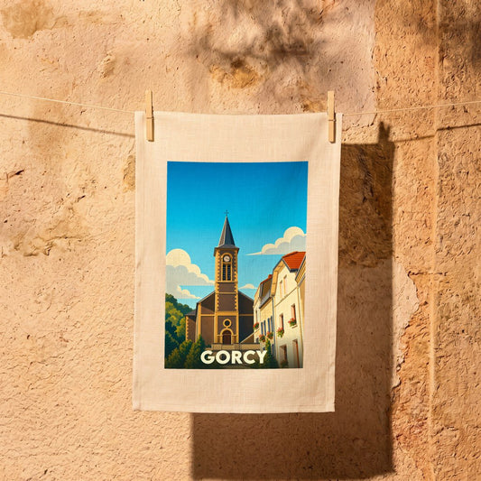 Torchon souvenir de la ville de Gorcy avec une illustration stylisée de son église.