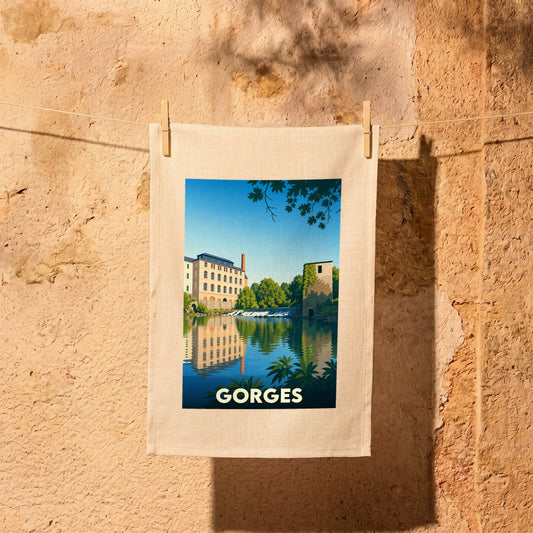 Torchon souvenir de la ville de Gorges illustré par un paysage stylisé au bord de l'eau.