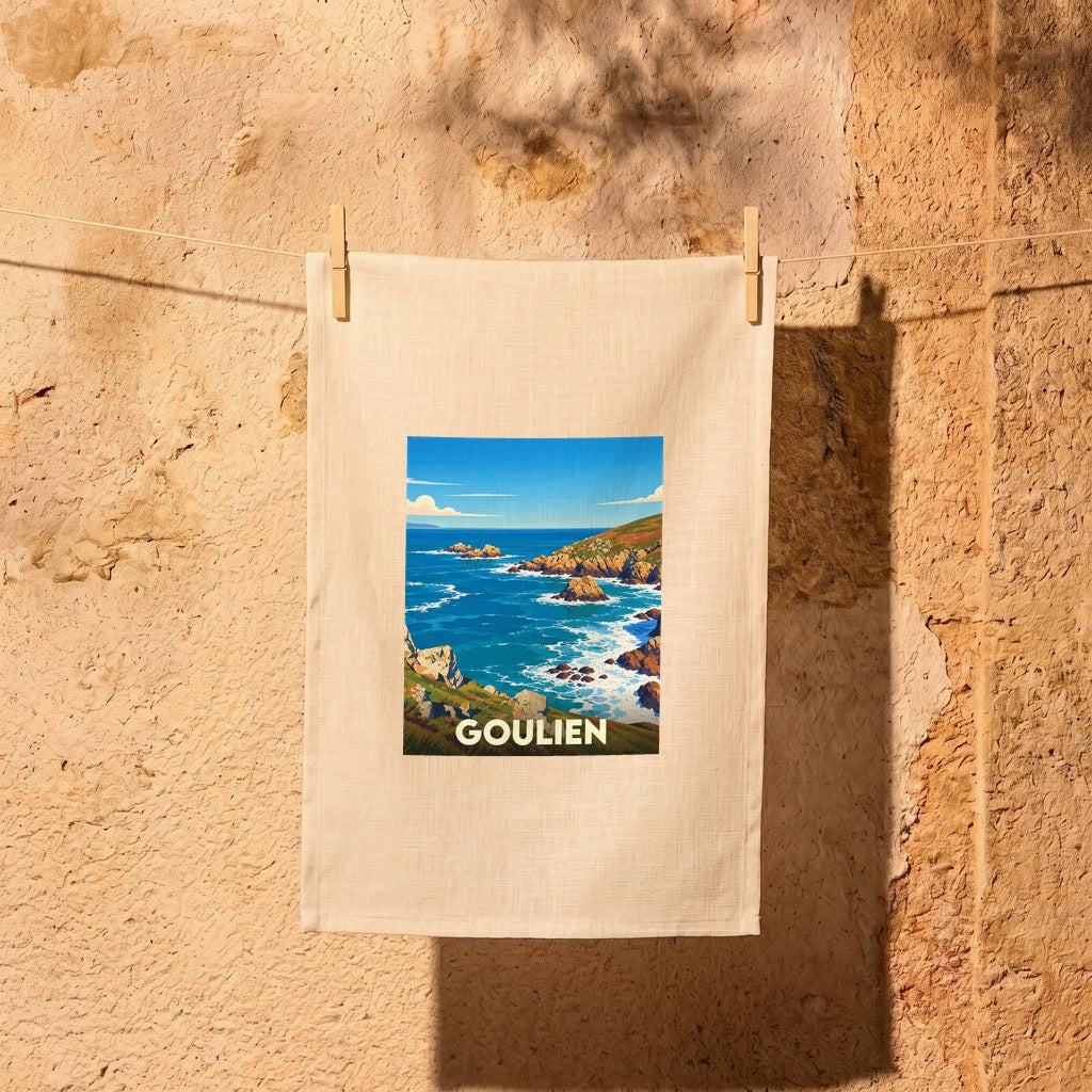 Torchon souvenir de la ville de Goulien avec une illustration stylisée d'un paysage côtier.