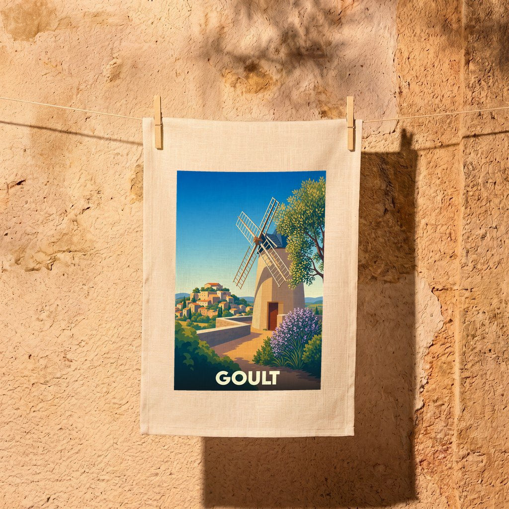 Torchon souvenir de la ville de Goult avec une illustration stylisée d'un moulin à vent et d'un village provençal.